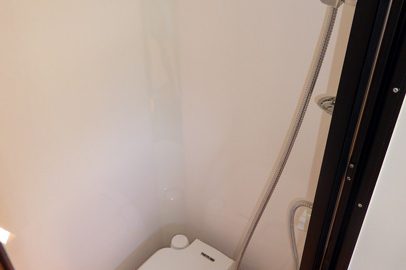 Ozcape Slide-On for dual cab, Shorta bathroom with toilet