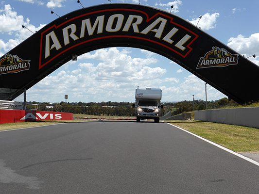 Ozcape Slide-On motorhome Woondabaa on race track in Bathurst