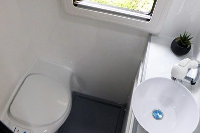 Ozcape Campers Slide-On Optima bathroom with shower, vanity and toilet