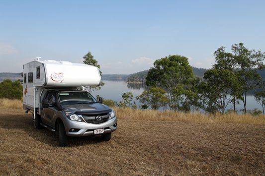 Ozcape Slide-On motorhome Woondabaa at the dam