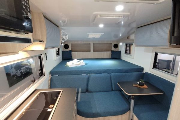 Ozcape Woondabaa interior with spacious living area and plenty of storage