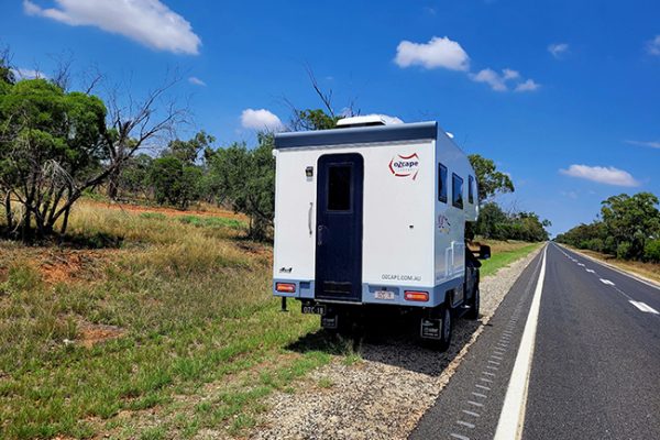 Ozcape camper on tour. Coffee break on the side of a country road.